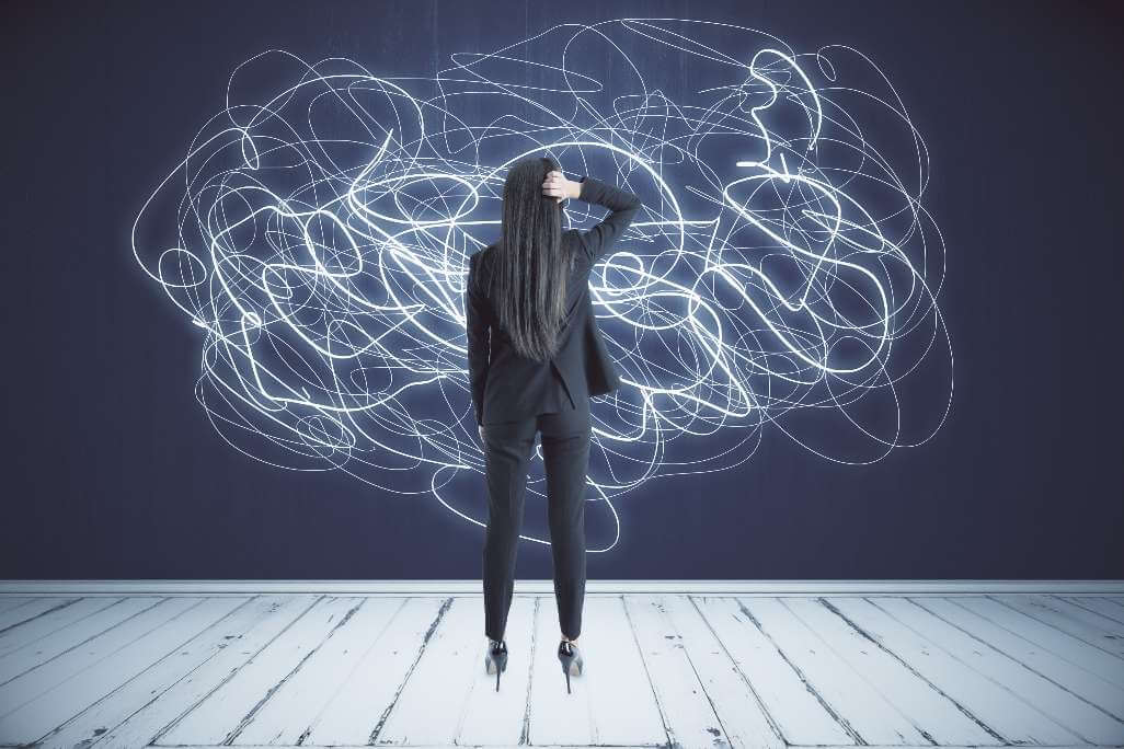 Business woman with overwhelmed nervous system