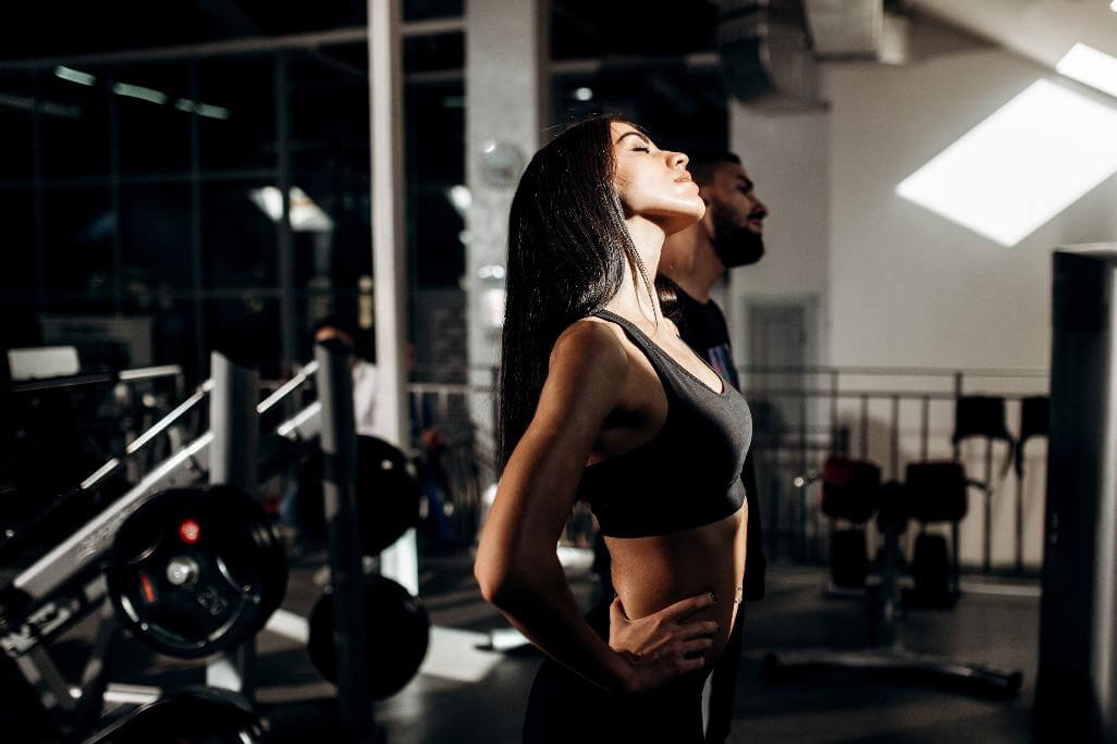 Woman in a gym during rest period